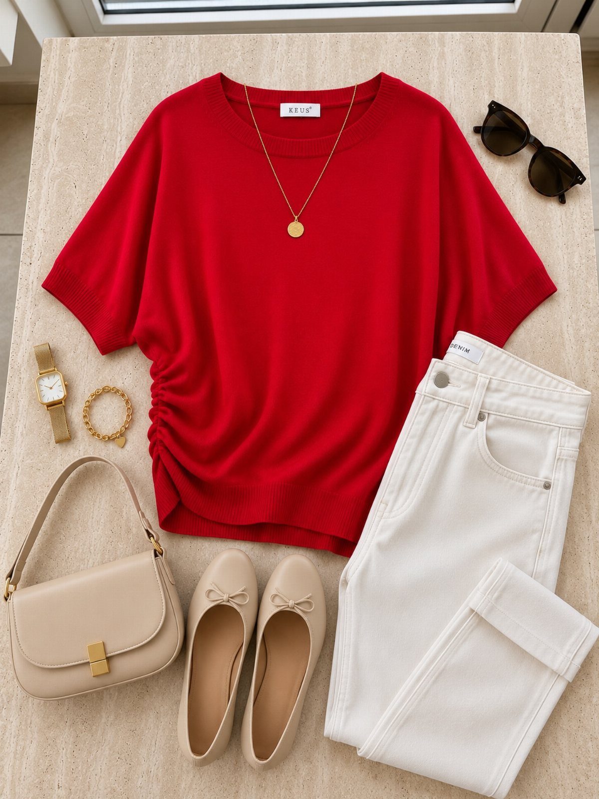 Red short-sleeved sweater paired with white jeans, beige flats, and a tan handbag.