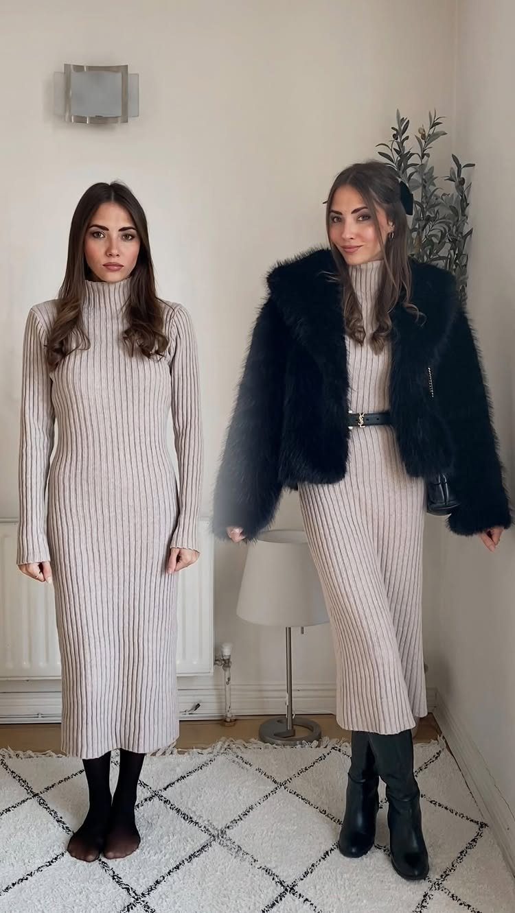 Two women posing in long, light-colored ribbed sweater dresses and black boots indoors.